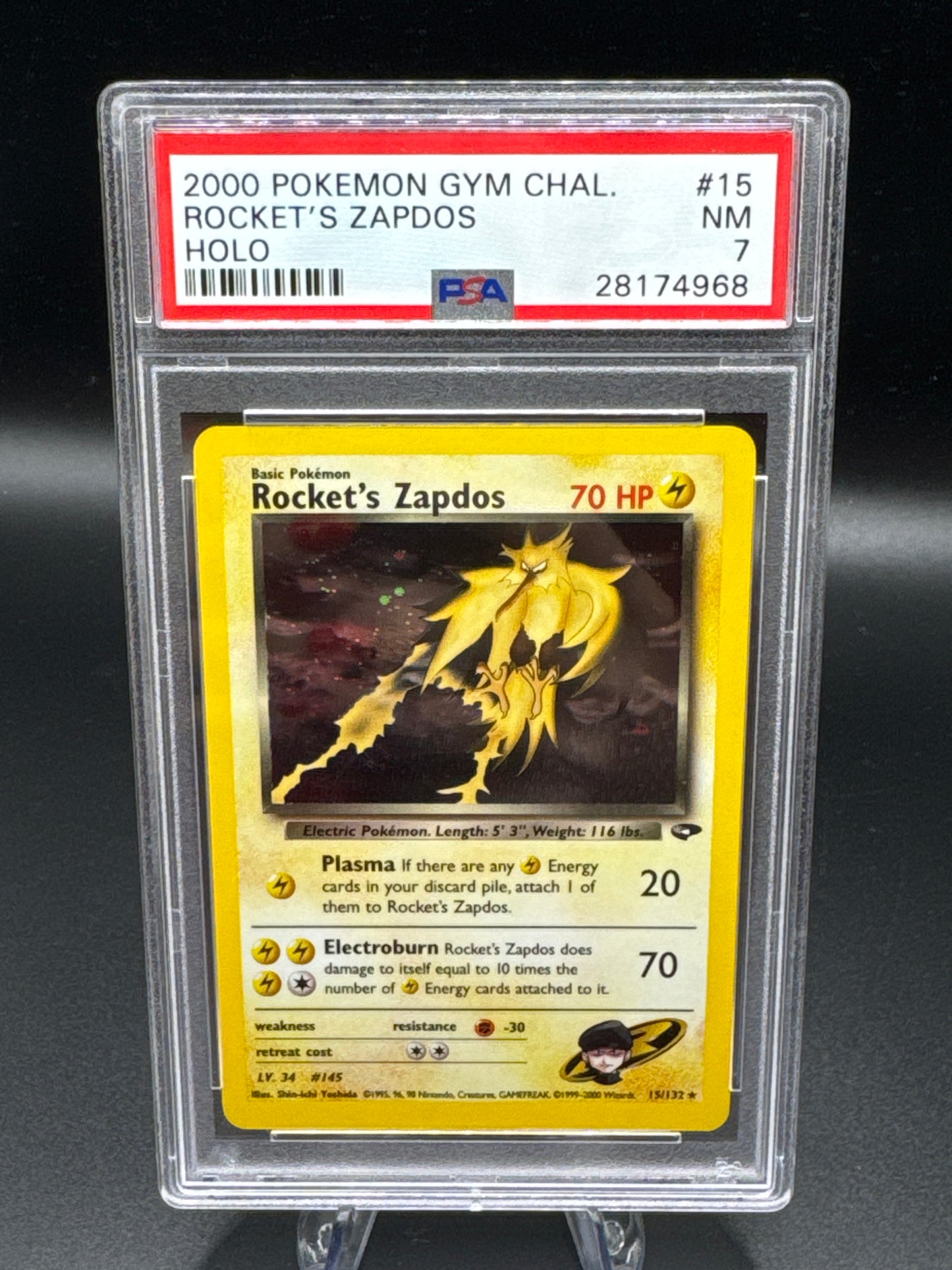 PSA 7 Pokémon TCG: 2000 Rocket's Zapdos 15/132 Gym Challenge