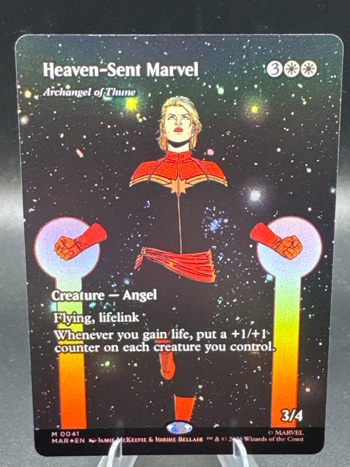 MTG TCG: Heaven-Sent Marvel - Archangel of Thune (Borderless) (Foil) - 0041 - Marvel Universe Eternal-Legal (MAR)
