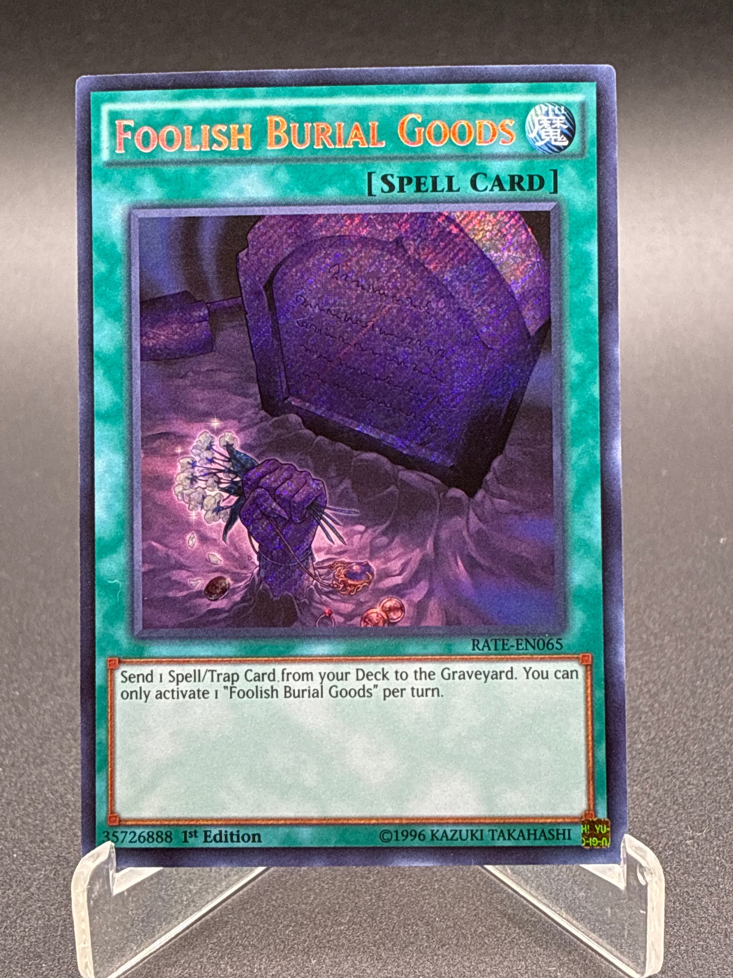 Yu-Gi-Oh! TCG: Foolish Burial Goods 1st Edition - RATE-EN065 - Raging Tempest (RATE)