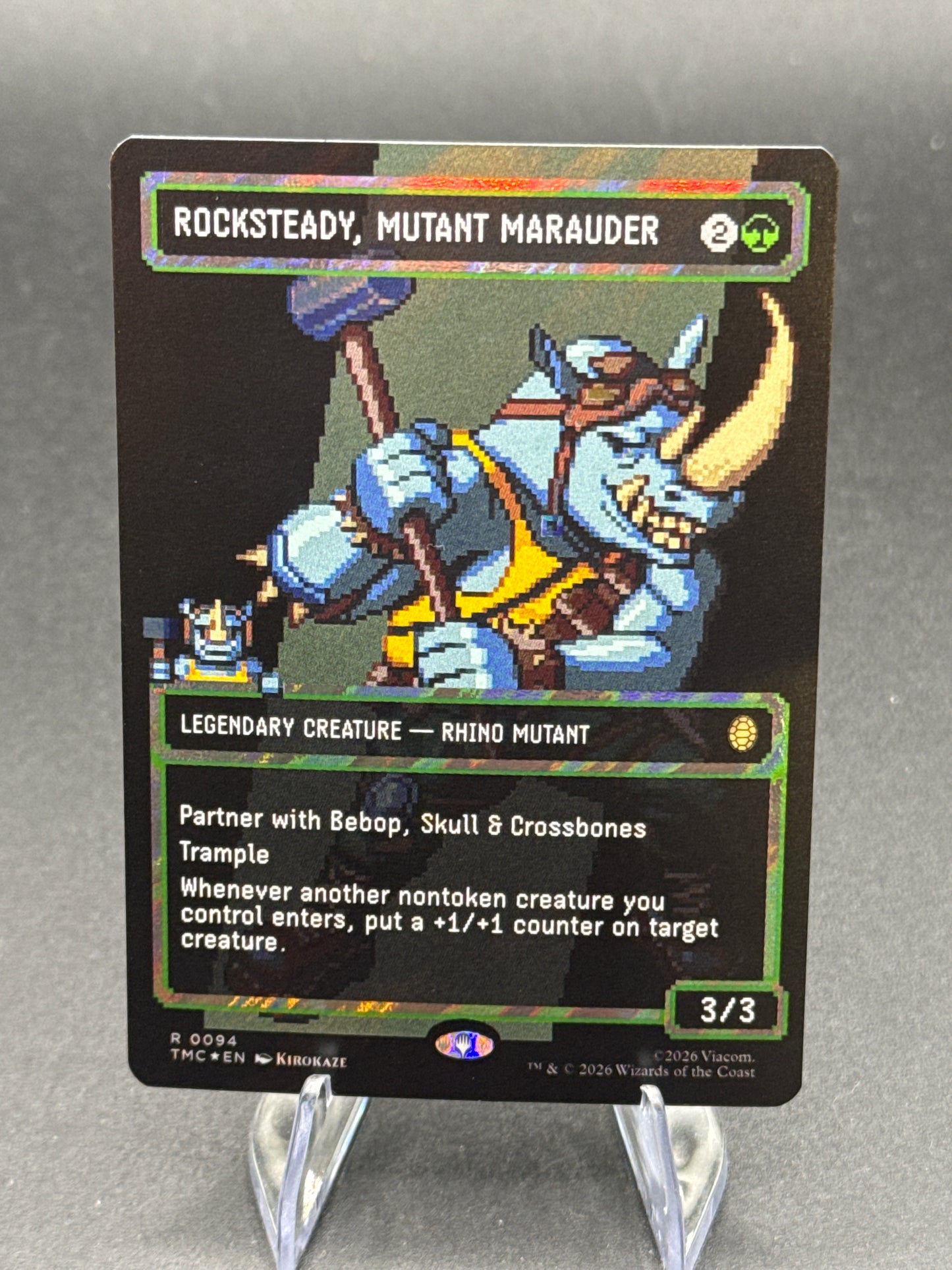 MTG TCG: Rocksteady, Mutant Marauder R 0094 (Borderless) (Surge Foil) - Commander: Teenage Mutant Ninja Turtles