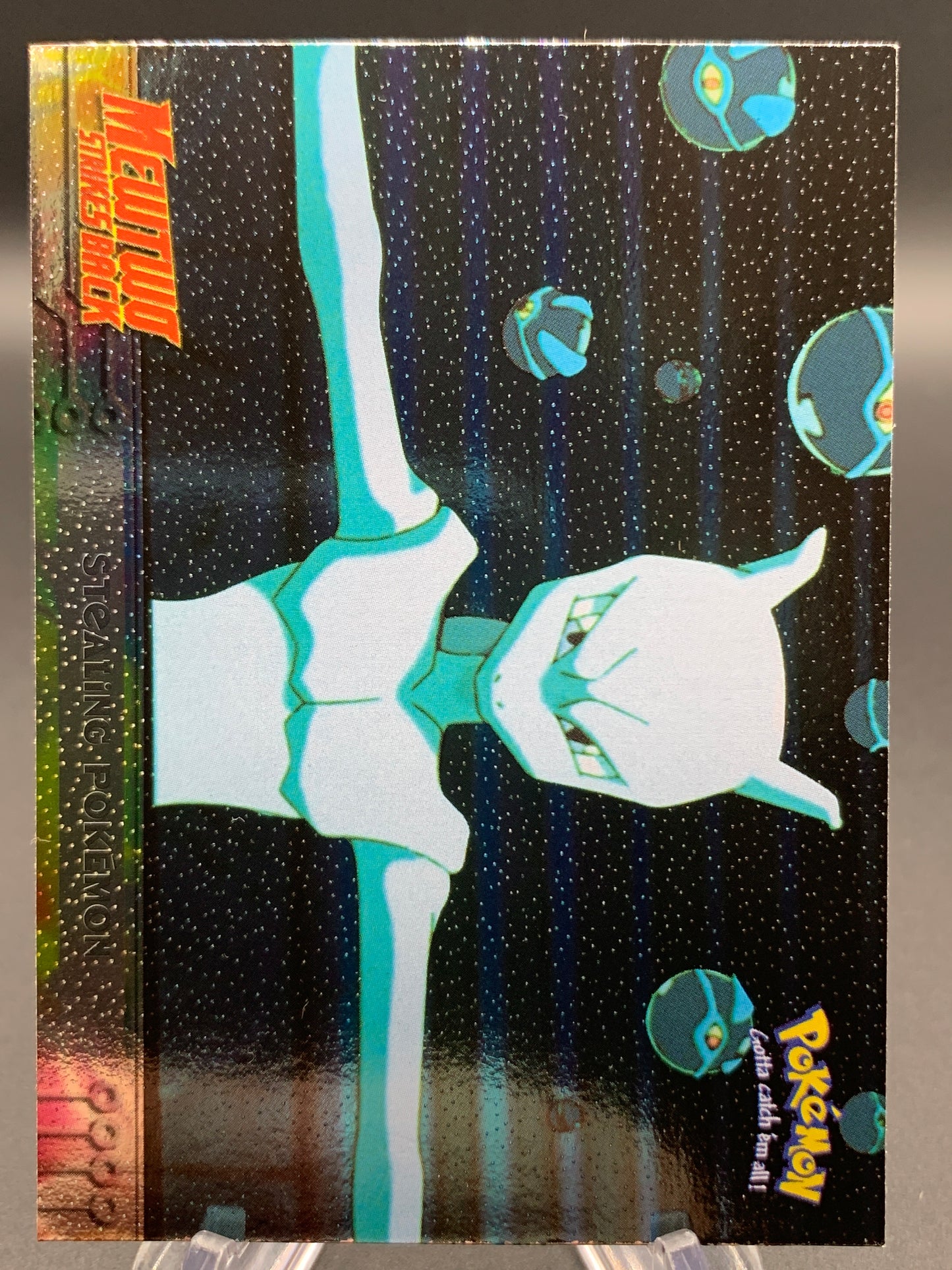 Pokémon TCG: Topps Pokémon Stealing Pokémon - #27 - Mewtwo Strikes Back Movie Animation Edition Holo Textured